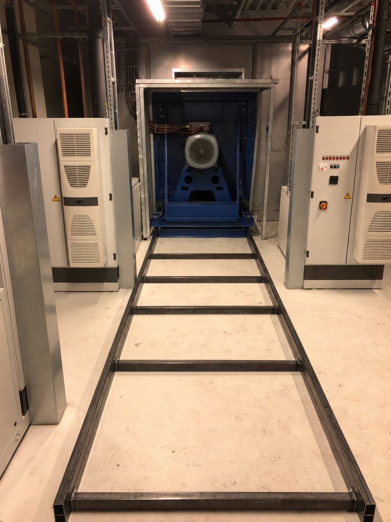 The finished rail system leads right up to the fan