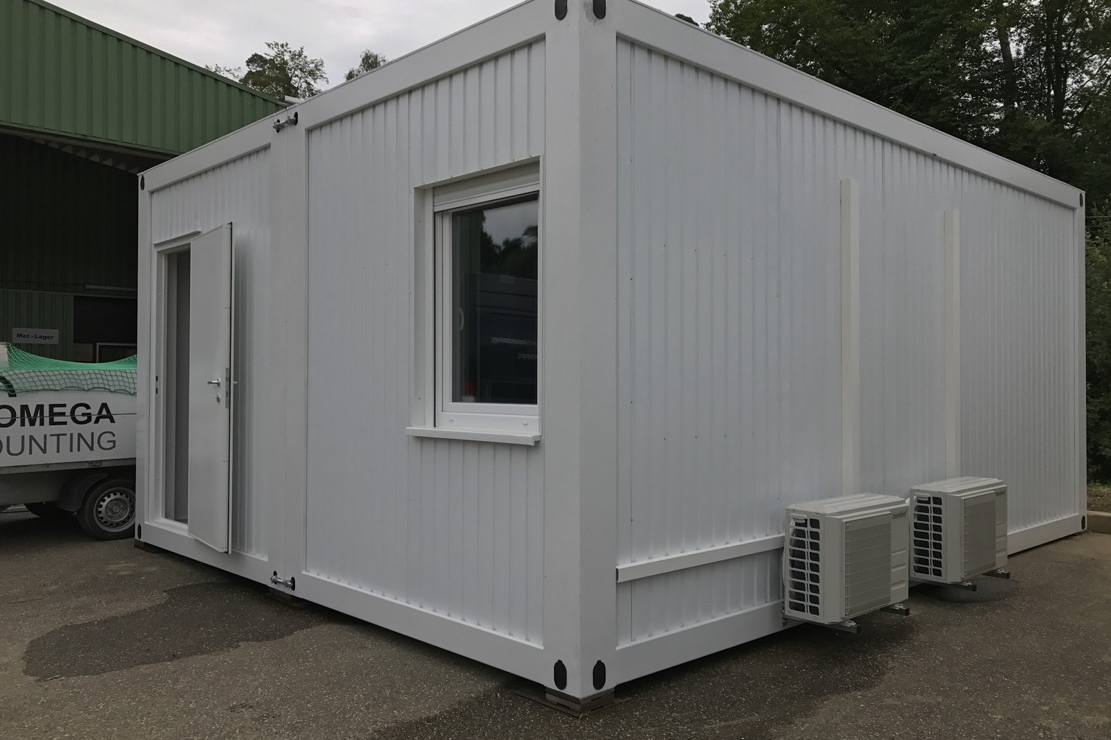 Finished room module with window, door and two split air conditioning units
